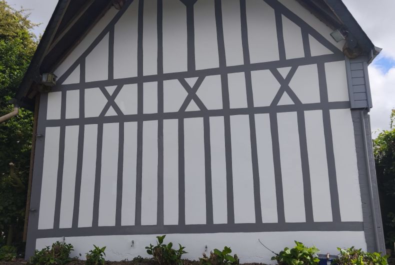 Façade à colombage après ravalement et peinture